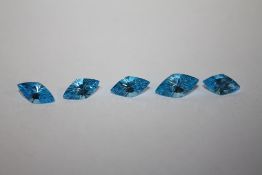 A COLLECTION OF SWISS BLUE TOPAZ STYLE STONES