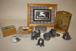A TRAY OF COLLECTABLES TO INCLUDE A MAPPIN AND WEBB CARRIAGE CLOCK, BURBERRYS PLAQUE ETC.