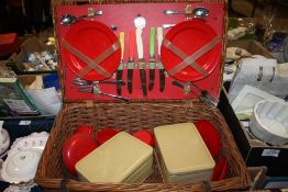 A VINTAGE WHICKER PICNIC HAMPER AND CONTENTS