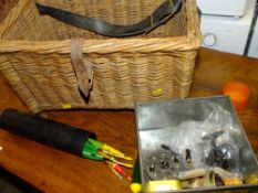 A WICKER BASKET PLUS CONTENTS TO INCLUDE FISHING REELS ETC