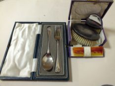 A CASED HALLMARKED SILVER HAND BRUSH TOGETHER WITH A HALLMARKED SILVER SPOON AND FORK SET