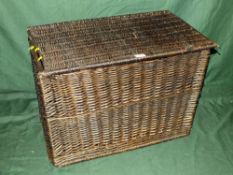 A LARGE WICKER HAMPER BASKET H-49 CM W-69 CM