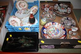 TWO TRAYS OF ORIENTAL CERAMICS, TWO ORIENTAL LAQUERWARE TRAYS, TOGETHER WITH A WOODEN PLINTH