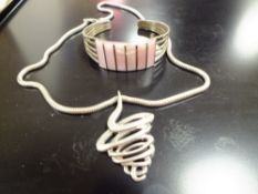 A STERLING SILVER TORNADO NECKLACE ON 925 SILVER CHAIN TOGETHER WITH A STERLING SILVER BANGLE,