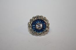 A DAISY SHAPED DRESS RING - size J