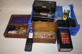 A TRAY OF COLLECTABLES TO INCLUDE A PIANO SHAPED JEWELLERY BOX, MOBILE PHONES ETC.