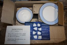 A BOXED DOULTON DINNERWARE SET