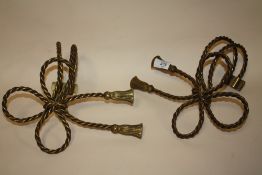 A PAIR OF VINTAGE BRASS CURTAIN TIES