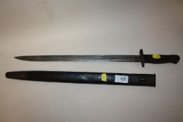 A 1907 REMMINGTON BAYONETTE IN SCABBARD