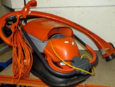 A FLYMO STRIMMER AND LAWNMOWER