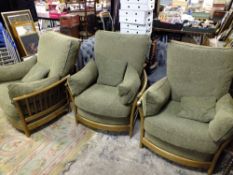 THREE ERCOL RENAISSANCE COTTAGE STYLE ARMCHAIRS