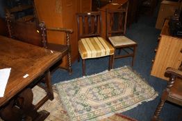 AN ANTIQUE MAHOGANY DINING CHAIR AN EDWARDIAN CHAIR AND A SMALL RUNNER RUG (3)