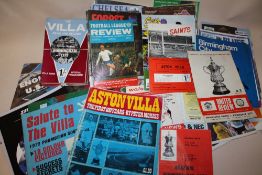A COLLECTION OF VINTAGE AND MODERN FOOTBALL PROGRAMMES TO INCLUDE A SIGNED EXAMPLE