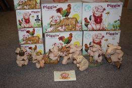 A COLLECTION OF BOXED PIGGIN FIGURES