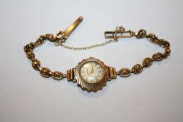 LADIES 9 CT ACCURIST WRISTWATCH ON 9CT GOLD STRAP