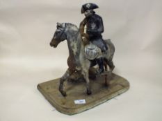 A VINTAGE CAST METAL FIGURE OF NAPOLEON ON HORSEBACK