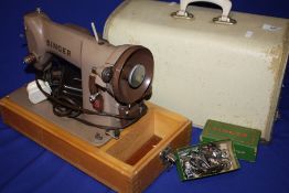 A CASED SINGER 198651 ELECTRIC SEWING MACHINE