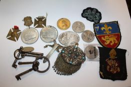 A COLLECTION OF MEDALLIONS, TURQUOISE SET MESH PURSE, MILITARY PATCHES ETC.