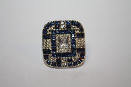 A LARGE ART DECO STYLE DRESS RING - size K