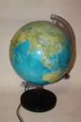 A MODERN ILLUMINATING DESK GLOBE