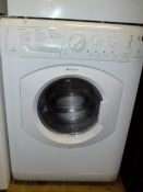 A HOTPOINT AQUARIUS WASHER AND DRYER