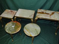 AN ONYX NEST OF THREE TABLES AND A PAIR OF ONYX TABLES (3)