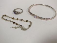 A GEM SET SILVER BANGLE TOGETHER WITH A CHILD'S BRACELET AND A SILVER DRESS RING, APPROX TOTAL