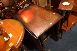 A HEAVY OAK DROPLEAF TABLE AND A CARD TABLE (2)