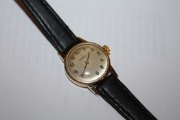 A LADIES 9CT GOLD CASED OMEGA WRISTWATCH
