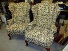 A PAIR OF VINTAGE PARKER KNOLL FLORAL ARMCHAIRS