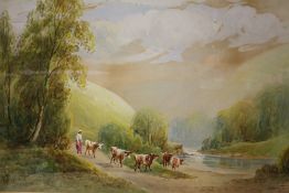 A GILT FRAMED AND GLAZED WATERCOLOUR OF A FIGURE DRIVING CATTLE TO THE STREAM, SIGNED R.E.HAGUE