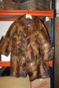 A VINTAGE LADIES FUR COAT