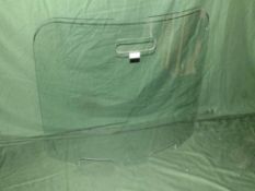 A MODERN CURVED GLASS / PERSPEX SCREEN - H- 71 W-80 CM