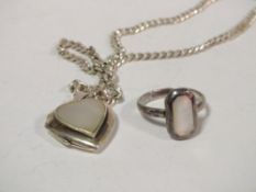 A MOTHER OF PEARL AND SILVER HEART SHAPED LOCKET ON CHAIN TOGETHER WITH A MOTHER OF PEARL AND SILVER