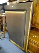 A LARGE MODERN HEADBOARD