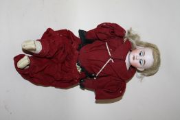 A VINTAGE GERMAN STYLE BISQUE HEADED DOLL