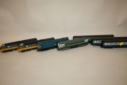 A COLLECTION OF HORNBY MODEL RAILWAY ELECTRIC TRAINS AND CARRIAGES ETC.