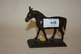 A SMALL BRONZE MODEL OF A DONKEY