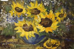 A FRAMED AND GLAZED OIL PAINTING OF SUNFLOWERS INDISTINCTLY SIGNED LOWER RIGHT, 49CM X 34CM