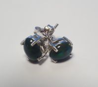 A PAIR OF CABOCHON BLACK ETHIOPIAN OPAL SILVER STUDS