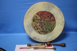 A BODHRAN WITH THREE BEATERS