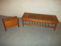 A TEAK COFFEE TABLE WITH STRETCHER RACK AND TEAK MAGAZINE RACK