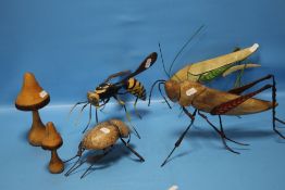 A COLLECTION OF WOOD AND METAL INSECTS TO INCLUDE A GRASSHOPPER, WASP, BEETLE ETC.