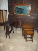 THREE ITEMS, AN OAK NEST OF THREE TABLES , A GATELEG DROP LEAF TABLE AND AN OVER MANTLE WALL MIRROR