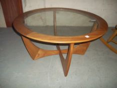 A ROUND GLAZED RETRO COFFEE TABLE