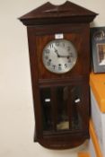 AN ENFIELD HANGING WALL CLOCK