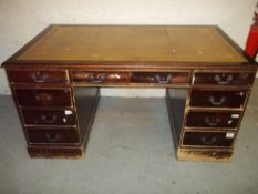 A VINTAGE LARGE LEATHER INLAID TWIN PEDESTAL REPRODUCTION DESK
