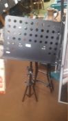 A MUSIC STAND AND STOOL