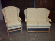 A TWO PIECE SUITE, TWO SEATER AND CHAIR