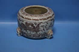 AN ORIENTAL FOOTED BOWL WITH DRAGON DESIGN